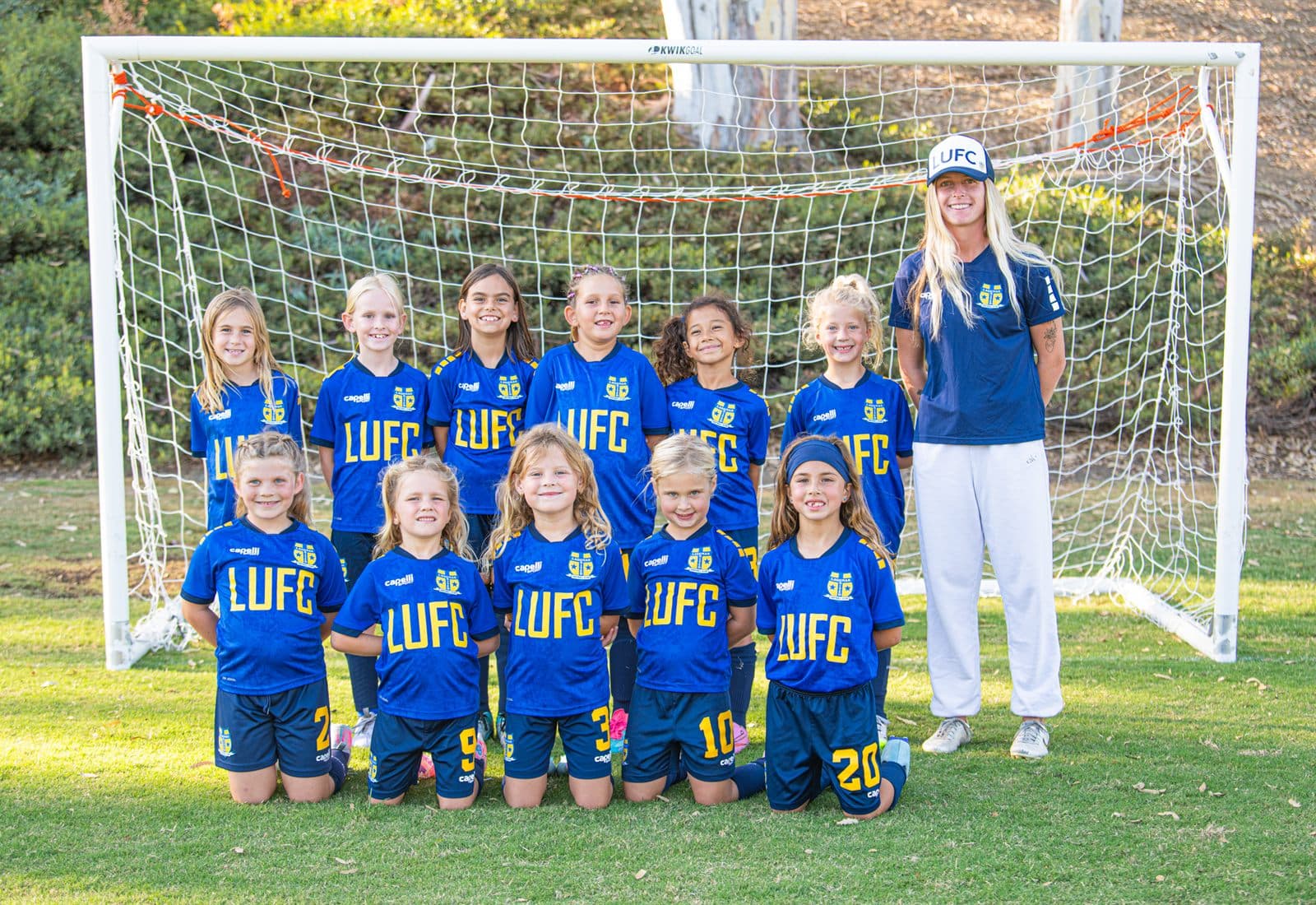 Coach Bella leading one of her girls teams in training
